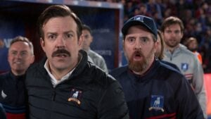 Jason Sudeikis as Ted Lasso and Brendan Hunt as Coach Beard in "Ted Lasso"